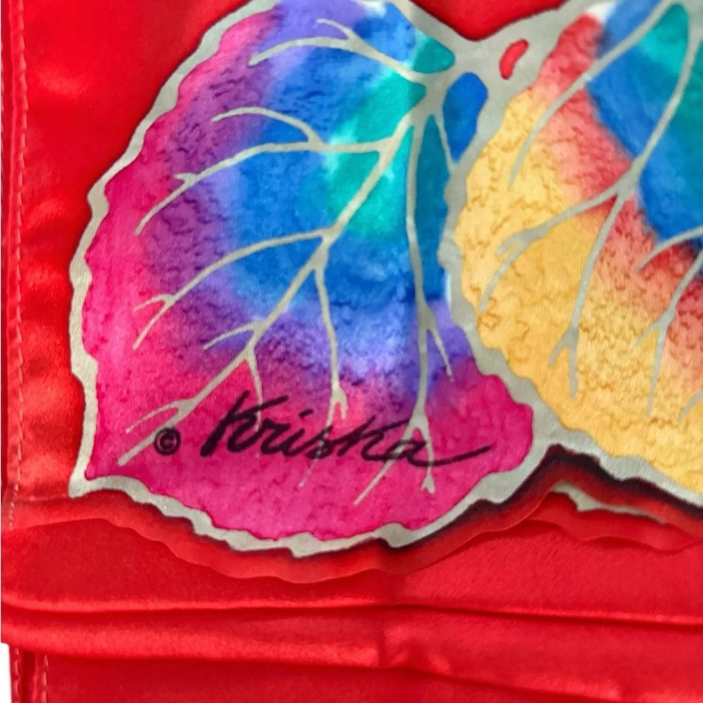 Kriska hand painted silk scarf. Red with multicolored leaves and cutouts. NWOT